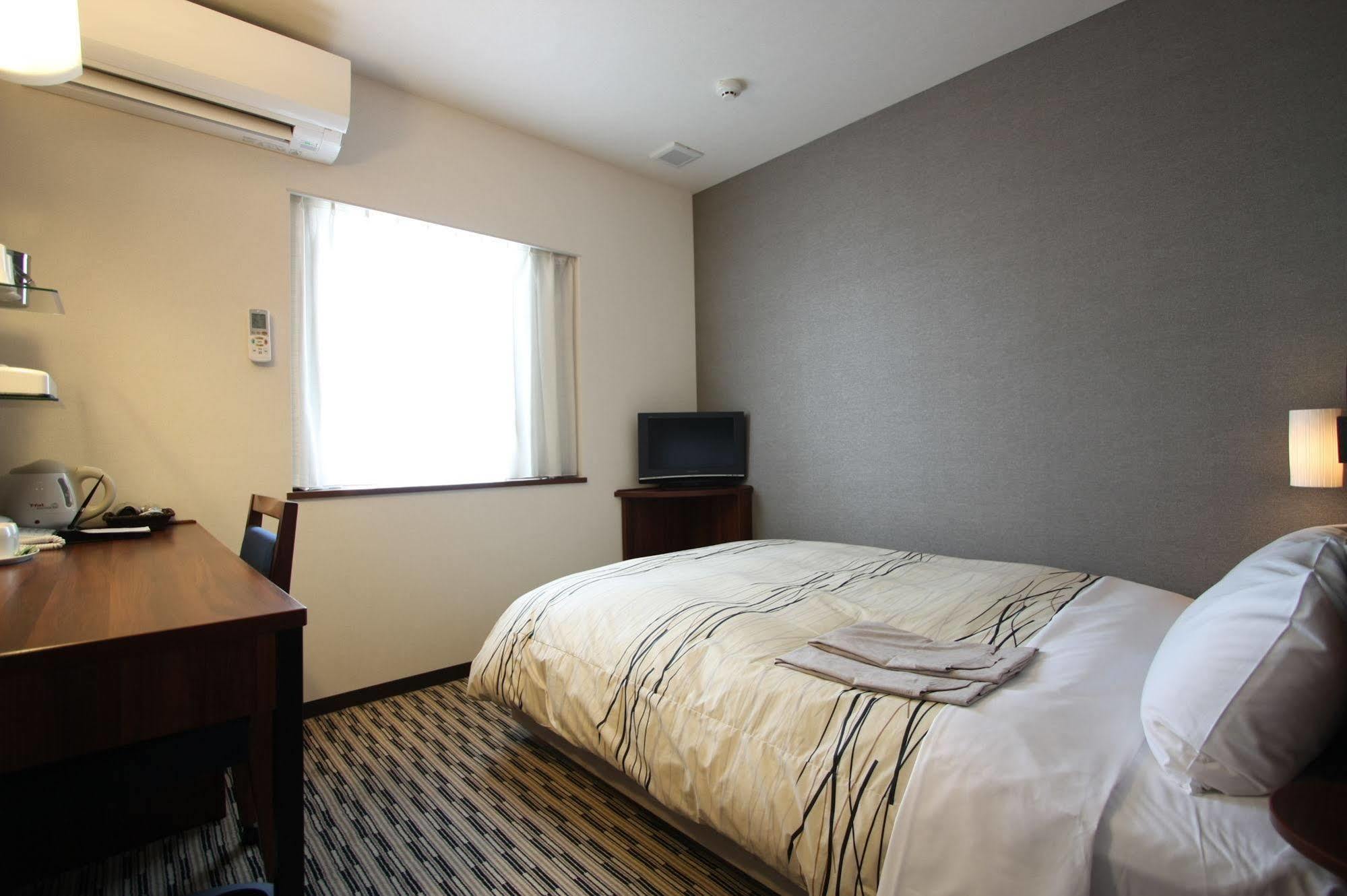 Uozu Manten Hotel Ekimae Екстериор снимка